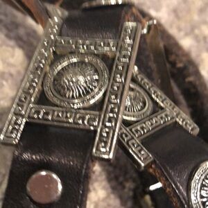 Gorgeous, brown leather with heavy silver accessories with sundial buttons belt